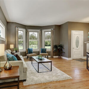 Open floor plan family room with fireplace and hardwood floor. Northwest, USA